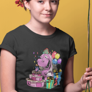 girl wearing a dinosaur birthday shirt