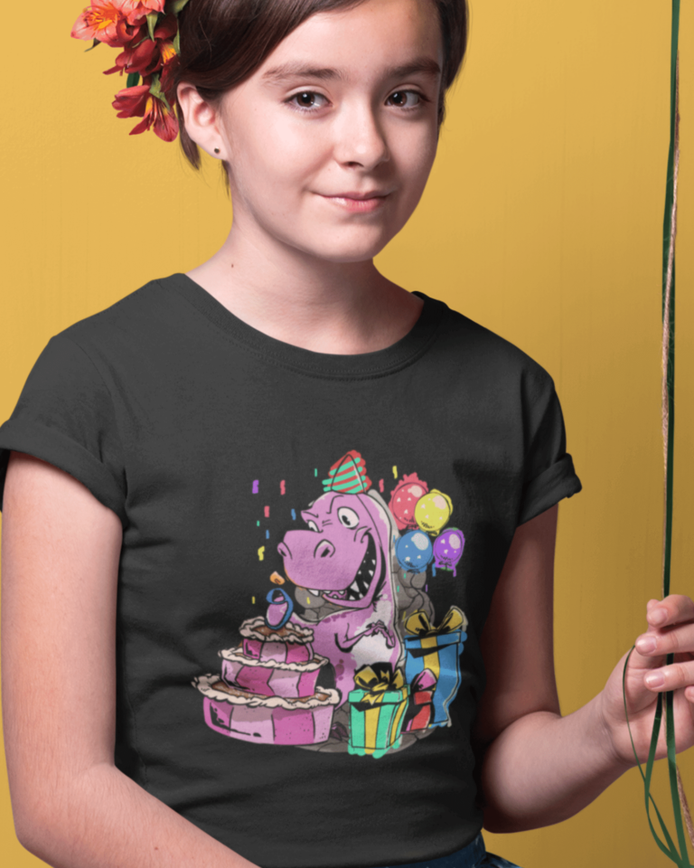 girl wearing a dinosaur birthday shirt