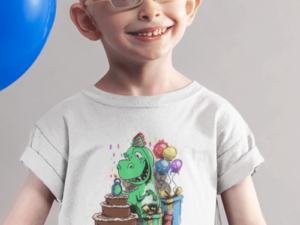 boy wearing a birthday shirt with a dinosaur on it