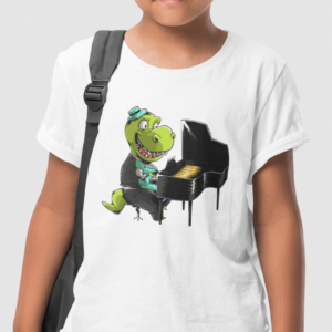 photo shows a boy wearing a shirt with a pianlo playing dinosaur
