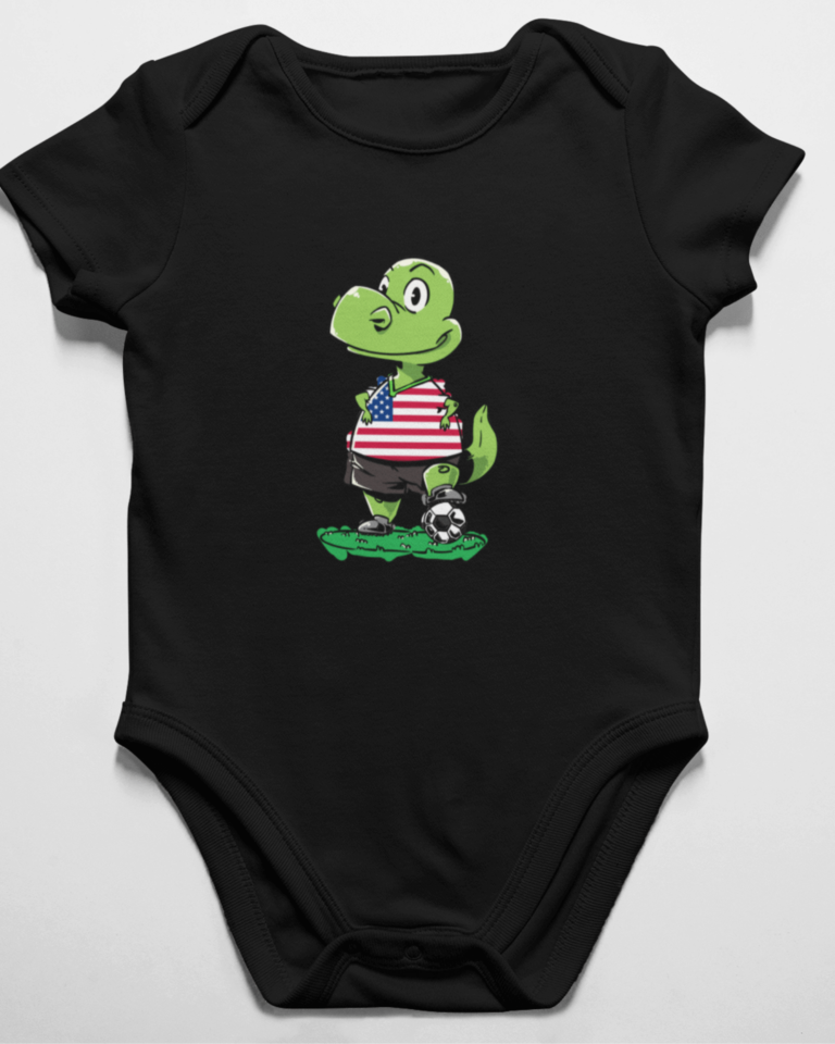 onesie baby clothes with a soccer dinosaur design on it