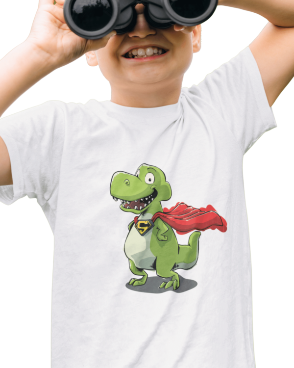 photo shows a boy wearing a superhero t shirt with a dinosaur